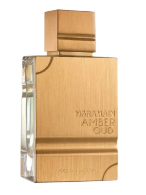 Prostokątny flakon perfum Haramain Amber Oud Gold Edition w szczotkowanym złotym kolorze, z przezroczystym bokiem ukazującym płyn, z widocznym napisem Haramain Amber Oud.