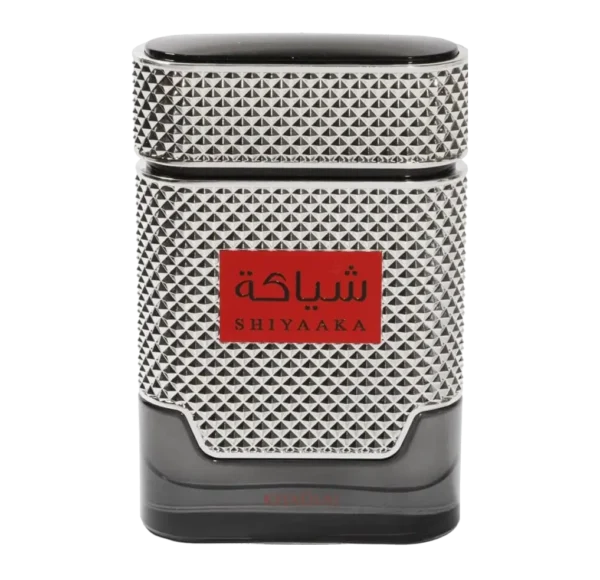 Prostokątny flakon perfum Khadlaj Shiyaaka Silver, czarny z metalicznym, srebrnym wzorem kratki i czerwoną etykietą z napisem SHIYAAKA.